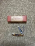 Rough Rider Amber Tiny Copperhead Pocket Knife RR186 Jigged Handles 2 Blades. Fixed Price $15.00.