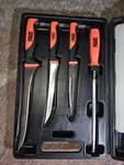 Angler's Choice 5 Piece Filet Knives Set W/cutting Board & Case. Fixed Price $21.00.
