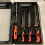 Angler's Choice 5 Piece Filet Knives Set W/cutting Board & Case. Fixed Price $19.95.