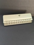 Levenger Circa Universal 11 Hole Disc Bound Paper Punch With Adjustable Slide. Fixed Price $58.95.