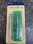(fa) Hobby Knife 8 Piece Set - Includes 6 Blades & With One Extra Handle **new**. Fixed Price $6.99.