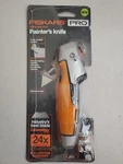 Fiskars Pro 770050-1001 Utility Knife Painters Orange/black. Fixed Price $13.45.