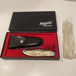 Schrade Scrimshaw 508 Raccoon Knife. Fixed Price $150.00.