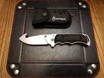 Gerber Freeman Guide Gut Hook Knife 3.6" 5CR15MOV Blade Tac-hide Handle&sheath. Fixed Price $32.99.