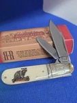 Rough Ryder - Barlow Custom Wildlife Series Racoon RR198RC. Fixed Price $30.00.
