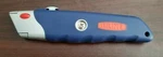 H-1369 Uline Blue & Red Knife With Soft Comfort Grip Handle "new Bag". Fixed Price $9.45.