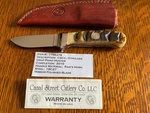 D'holder Canal Street Drop Point Hunter Knife Ram's Horn S/N#004 W/sheath. Fixed Price $675.00.