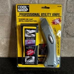 New Tool Shop Professional Utility Knife W/ Belt Clip Holster 243-5398 Metal. Fixed Price $12.97.