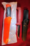 Morakniv Knives Lot: New Companion Orange Stainless & Used Red Basic 511 Carbon. Fixed Price $30.00.