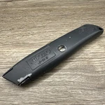 Stanley 10-099 Retractable Utility Knife, No Blades, Pat. 4586256. Fixed Price $9.99.