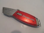 Snap-on Retractable Utility Knife Model No. UTK100. Fixed Price $24.00.