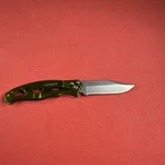 Gerber Folding Knife Open Frame With Green Pocket Clip 4660713A Nice Condition. Fixed Price $13.00.