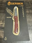 Gerber Gear Zilch Folding Pocket Knife 3.1 Inch Plain Edge Blade Drab Red. Fixed Price $28.00.