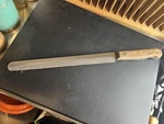 Chicago Cutlery 10" Bread Knife. Fixed Price $25.00.