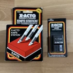 Vintage X-acto Knife Station Storage Block & #10 Curved Blades With Dispenser. Fixed Price $20.00.