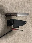 Buck Knives 863 Selkirk Fixed Blade Knife With Brown And Black Micarta. Fixed Price $60.00.