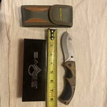 SK-909 Sarge Knife Camo 3.5" Gut Hook Liner Lock Folder Sheath New Box. Fixed Price $24.99.