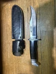Buck Knives Usa 119 Black Phenolic Handle Fixed Blade Knife With Leather Sheath. Fixed Price $70.00.