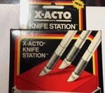 New X-acto X3801 Knife Station For Safe Storage Plus Protects And Cleans Blades. Fixed Price $19.75.