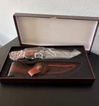 New Knife Fixed Skinner With Leather Sheath And Box. Fixed Price $80.00.