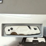Milwaukee Fastback Cerakoted White/bronze Folding Knives. Fixed Price $50.00.